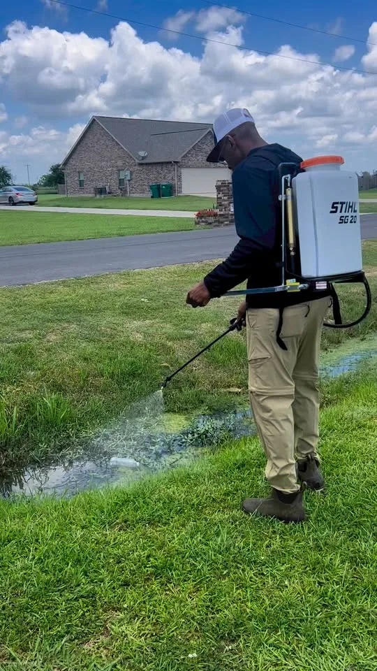 Lawn treatment application near a drainage area